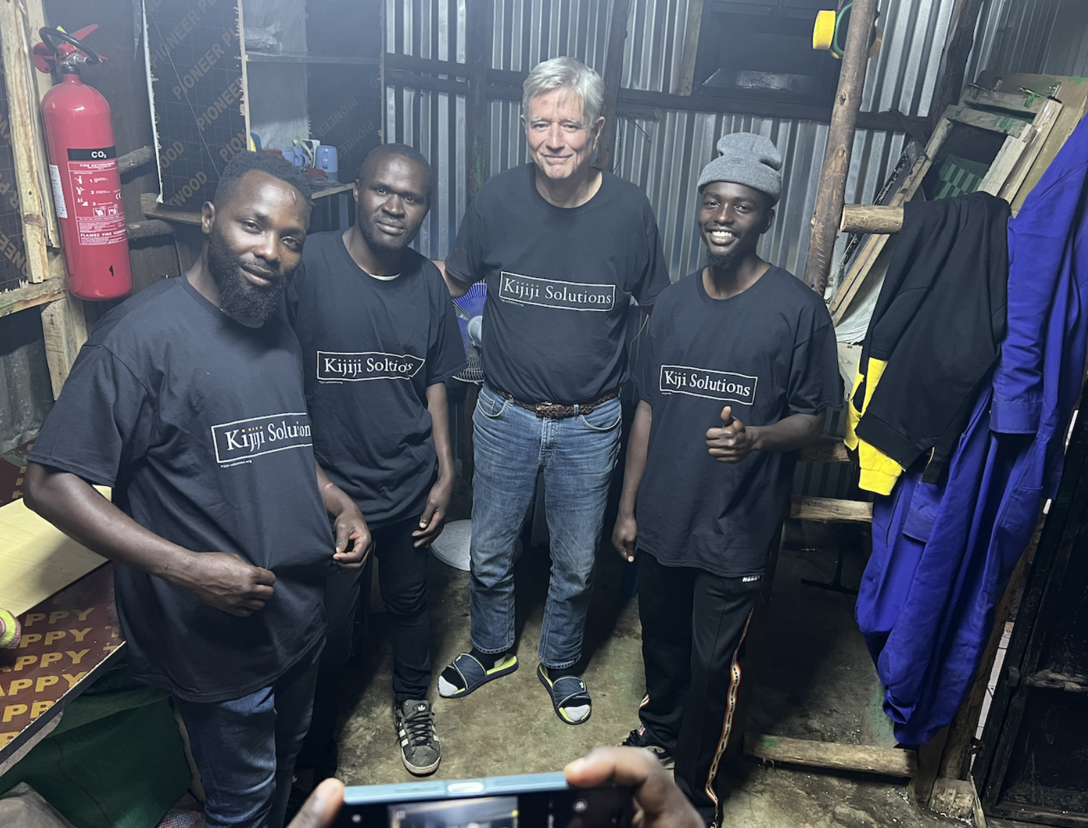 (L-R) Kijiji Solutions Chess Works production crew members Elisha Ong'ola and Isaiah Ooko join Kijiji Solutions founder Richard Haukom and artist Gwako at Kijiji House, March 30, 2026. /Kijiji Solutions