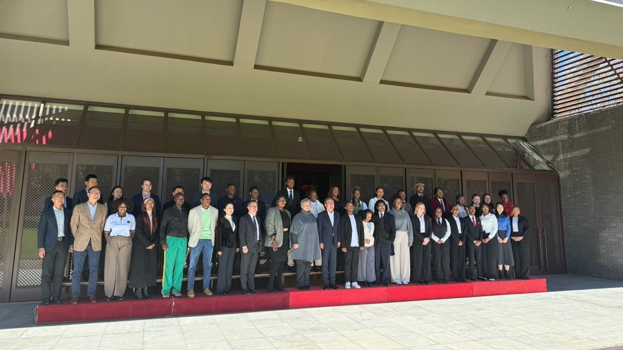 Participants pose for a group photo during a youth exchange program on South-South Cooperation in a Multilateral World at the Chinese Embassy in Pretoria, South Africa, May 7, 2026. /Photo by CMG reporter Zhao Yinan