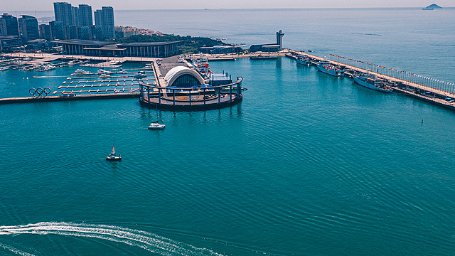 Boats seen sailing at Qingdao International Sailing Center on July 25, 2020. /CFP

