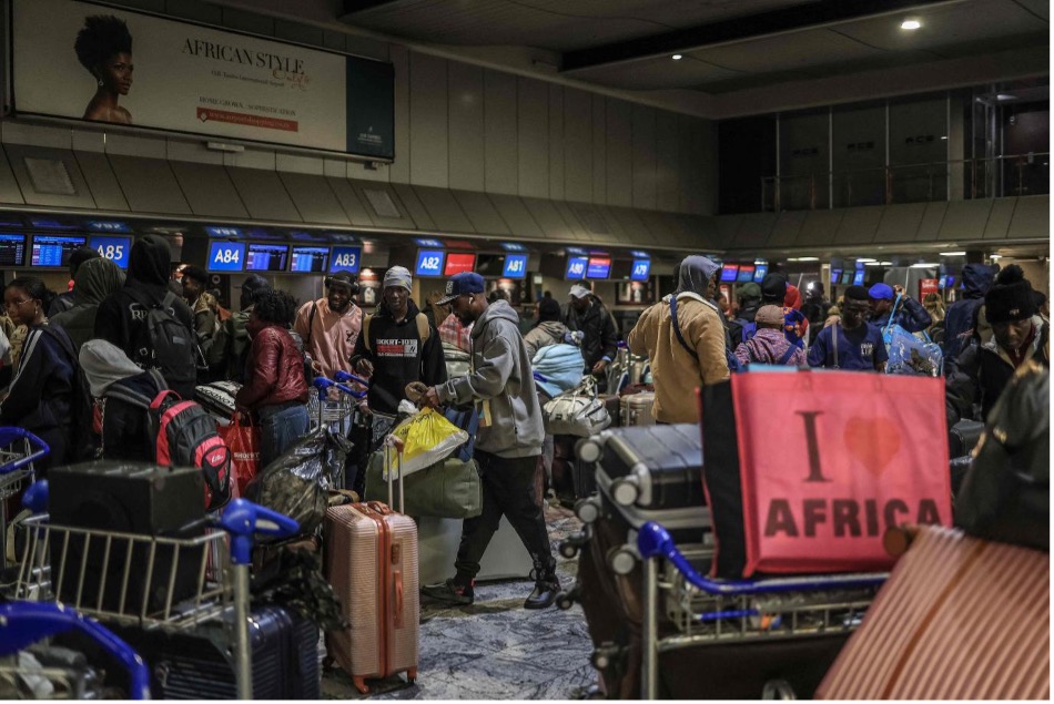 Ghanaian nationals stand at the check-in desk for an evacuation flight at OR Tambo International Airport in Ekurhuleni, May 27, 2026. Ghana on May 26 announced it was evacuating 300 citizens from South Africa, after an upsurge in xenophobic incidents across the country in recent weeks. /CFP