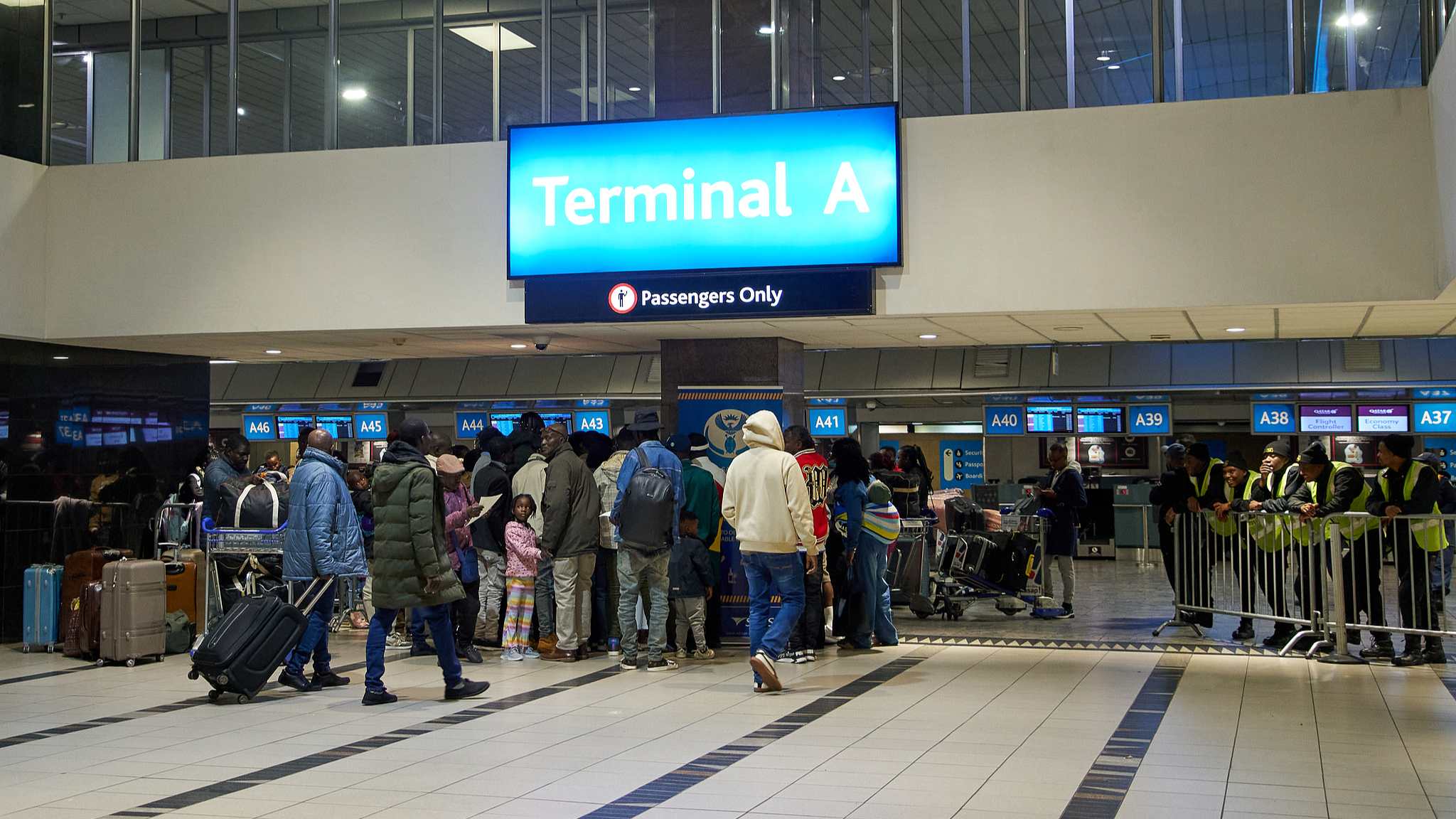 Ghanaian nationals arrive at OR Tambo International Airport in Johannesburg, South Africa, ahead of a repatriation flight to Ghana on May 27, 2026. /CFP