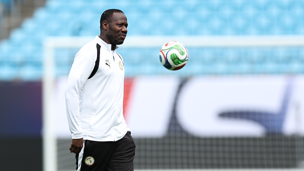 Head coach Pape Thiaw of Senegal walks on the pitch during the training session one day ahead of the friendly match between Senegal and United States at Bank of America Stadium on May 30, 2026 in Charlotte, North Carolina. /CFP