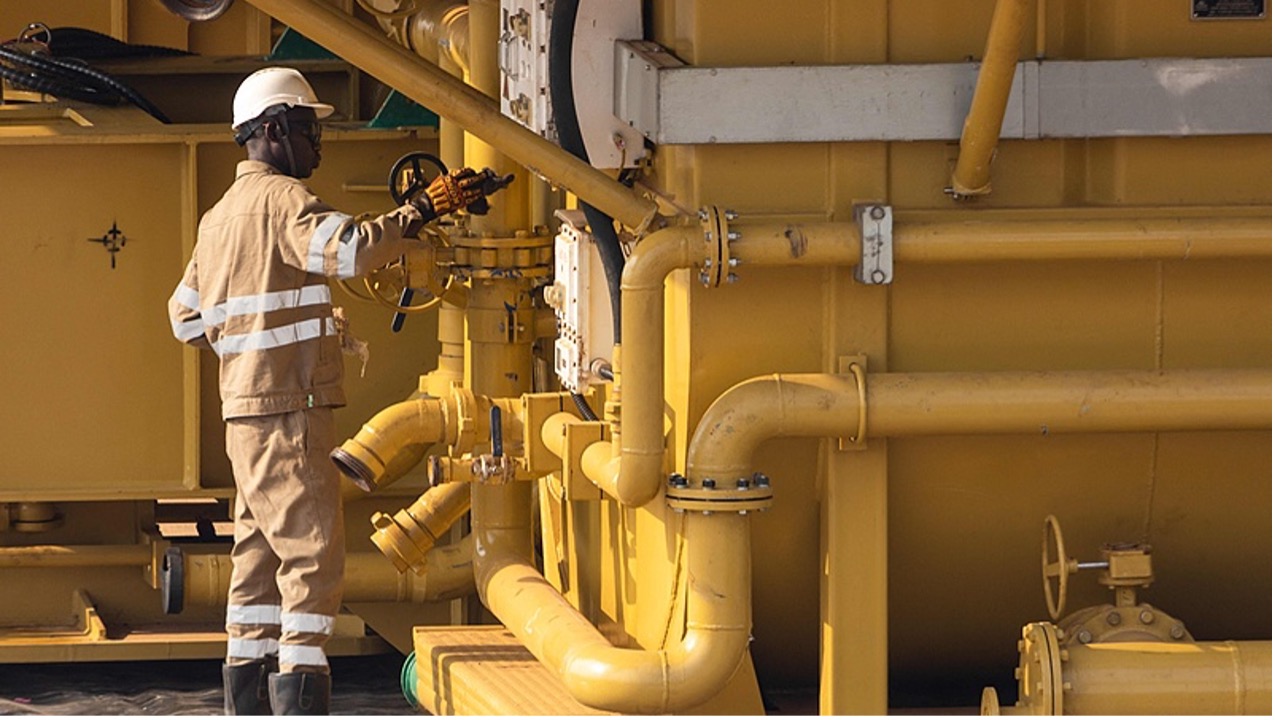 TotalEnergies employees work at a well pad under construction inside Murchison Falls National Park in western Uganda on February 22, 2023. /CFP
