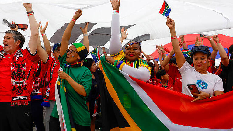 South African soccer fans cheer for their national team on a public street in Seoul, South Korea on June 25, 2026. /CFP
