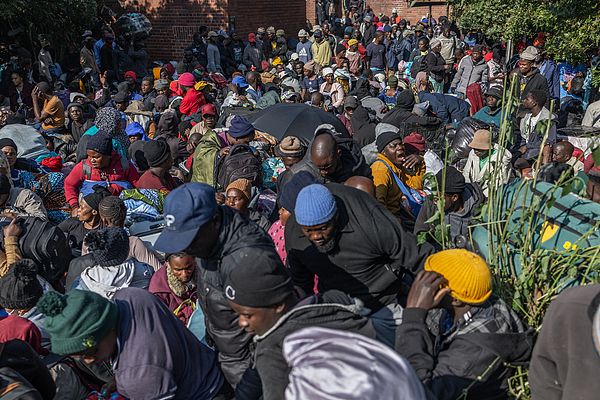 Malawian displaced persons prepare to leave by car outside an abandoned municipal building on the Mayor's Walk, Pietermaritzburg, South Africa, June 23, 2026. /VCG