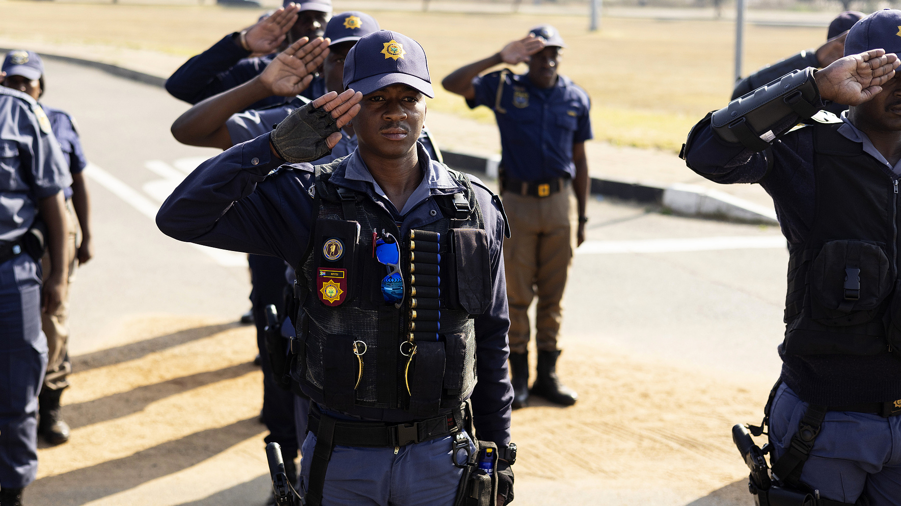 Members of the South African Police Services (SAPS) gather during a deployment parade prior to the nationwide anti-immigrant movement national shutdown, in Johannesburg, South Africa, 26 June 2026. /CFP