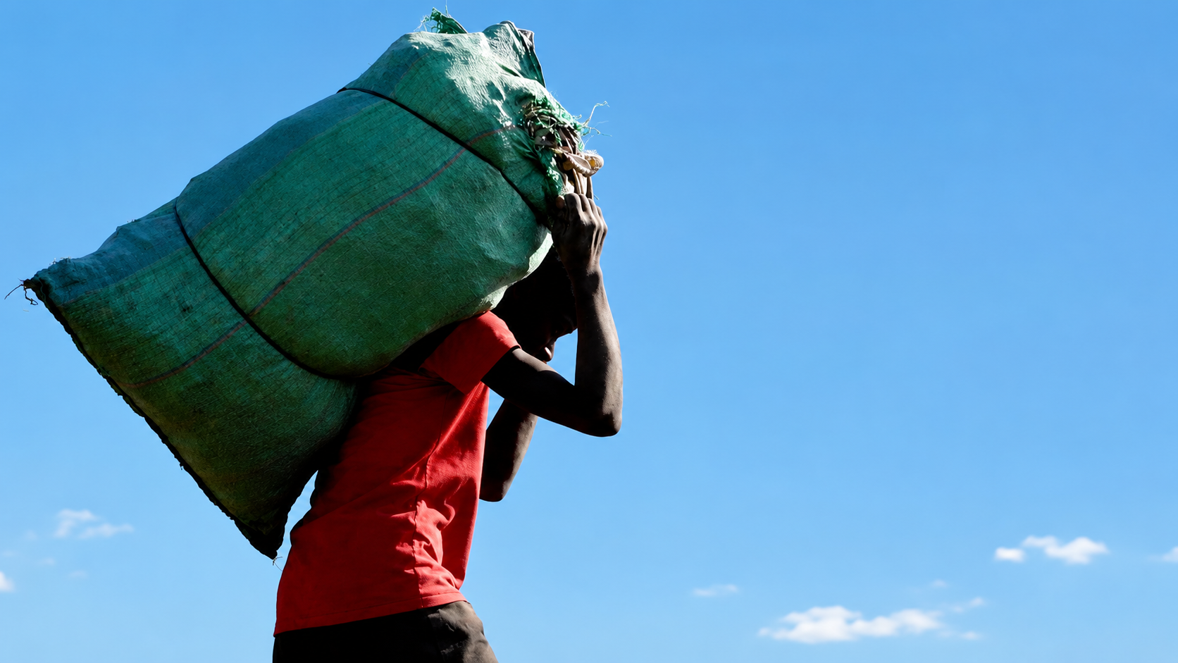 A man carrying plastic waste to the processing zone, July 3, 2026. /CGTN Africa
