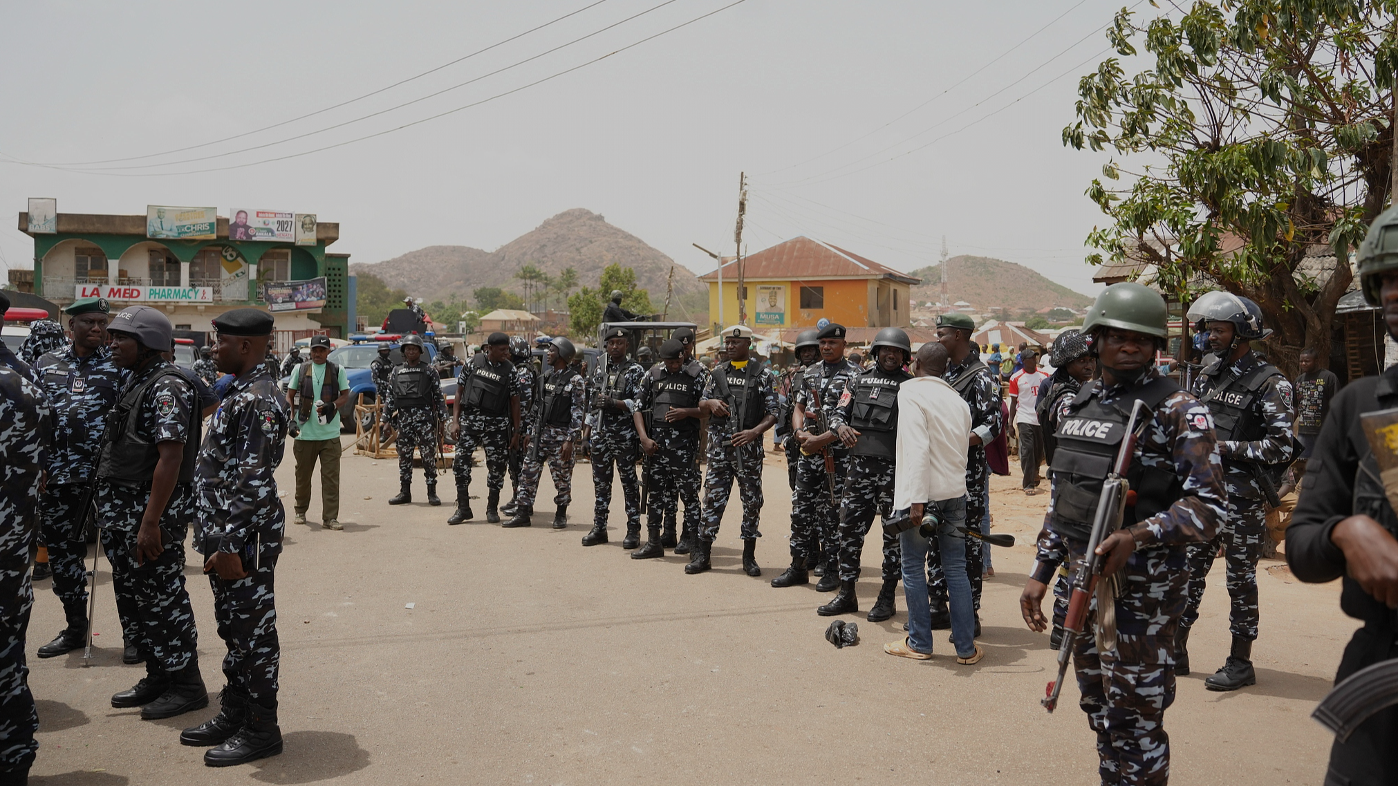 Police officers gather at the scene of a gunmen's attack in Gari Ya Waye community in Jos North, Nigeria, March 30, 2026. /CFP