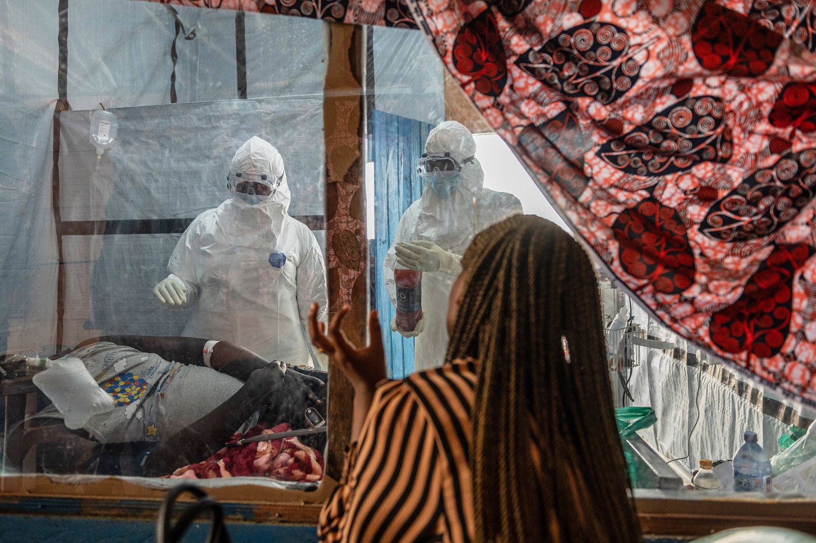 Healthcare workers attend to an Ebola patient at the Rwampara treatment center, in Ituri Province, DR Congo, on June 18, 2026. /CFP