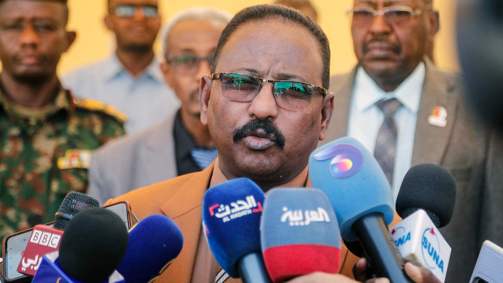Sudan Minister of Justice, Dr. Abdullah Dirif, speaks to the press while displaying weapons allegedly captured by the Sudanese army in Khartoum, on July 16, 2026. /CFP