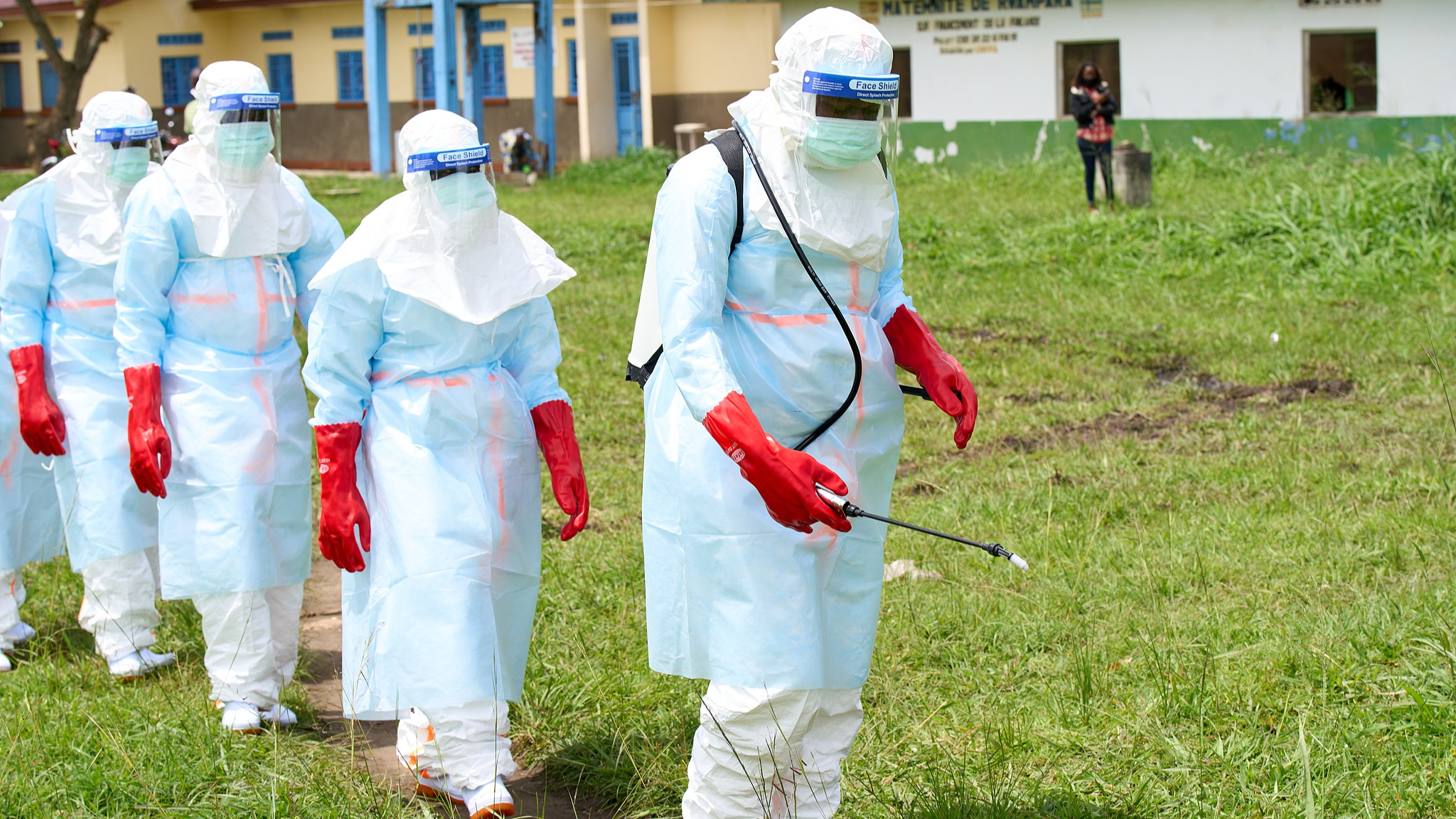 Health workers arrive at a treatment center to conduct disinfection drills in Rwampara, Democratic Republic of the Congo, May 21, 2026. / CFP