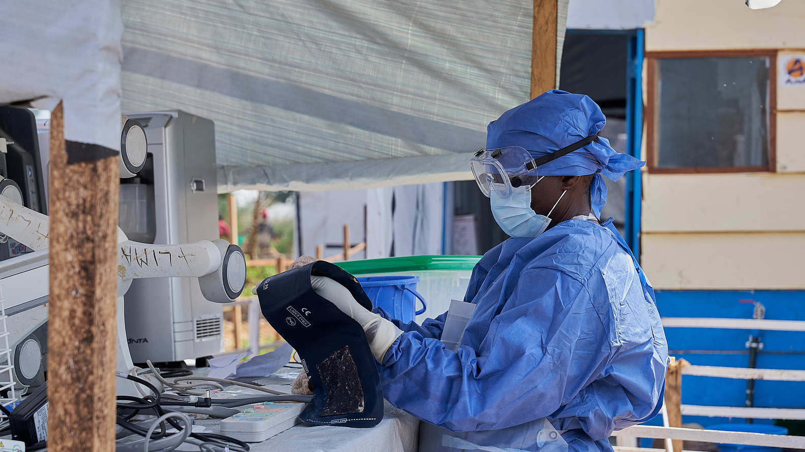 A health worker prepares equipment at an Ebola treatment center run by the NGO Alliance for Medical Action (ALIMA) in Rwampara, Ituri, Democratic Republic of Congo, June 20, 2026. /CFP