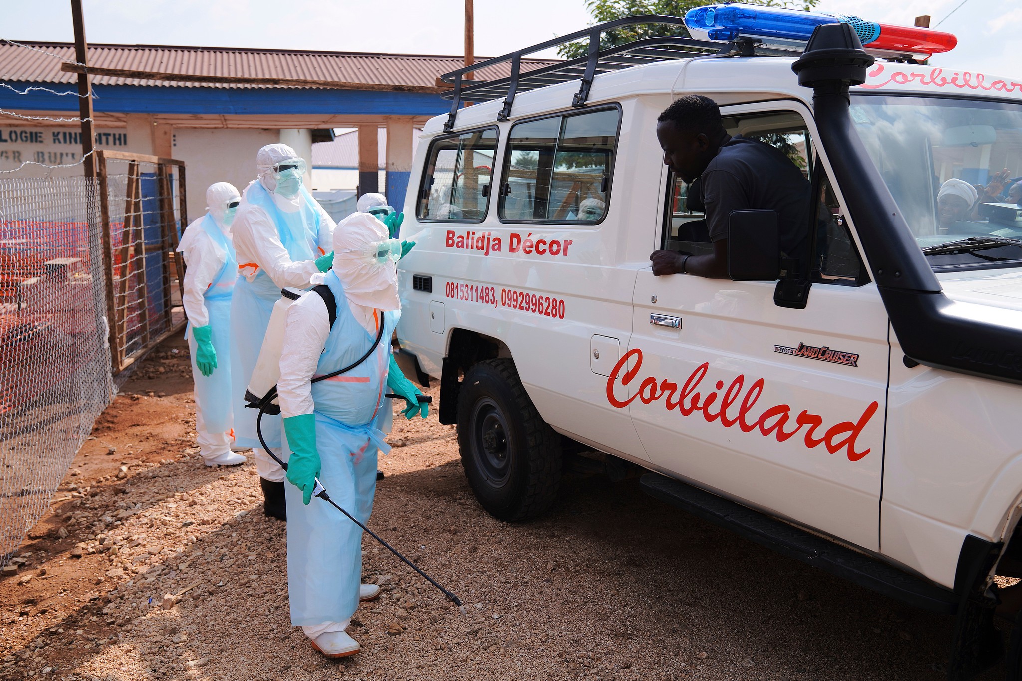 Health workers disinfect an ambulance at the Ebola Treatment Center at Bunia General Hospital in Ituri, DR Congo, July 22, 2026. /CFP