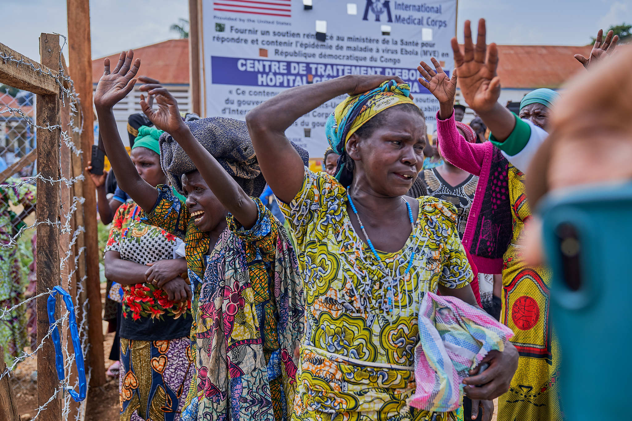 Relatives of Ebola patients crying outside the Ebola treatment center of the General Hospital, Bunia, Ituri Province, the Democratic Republic of the Congo, July 22, 2026. /CFP