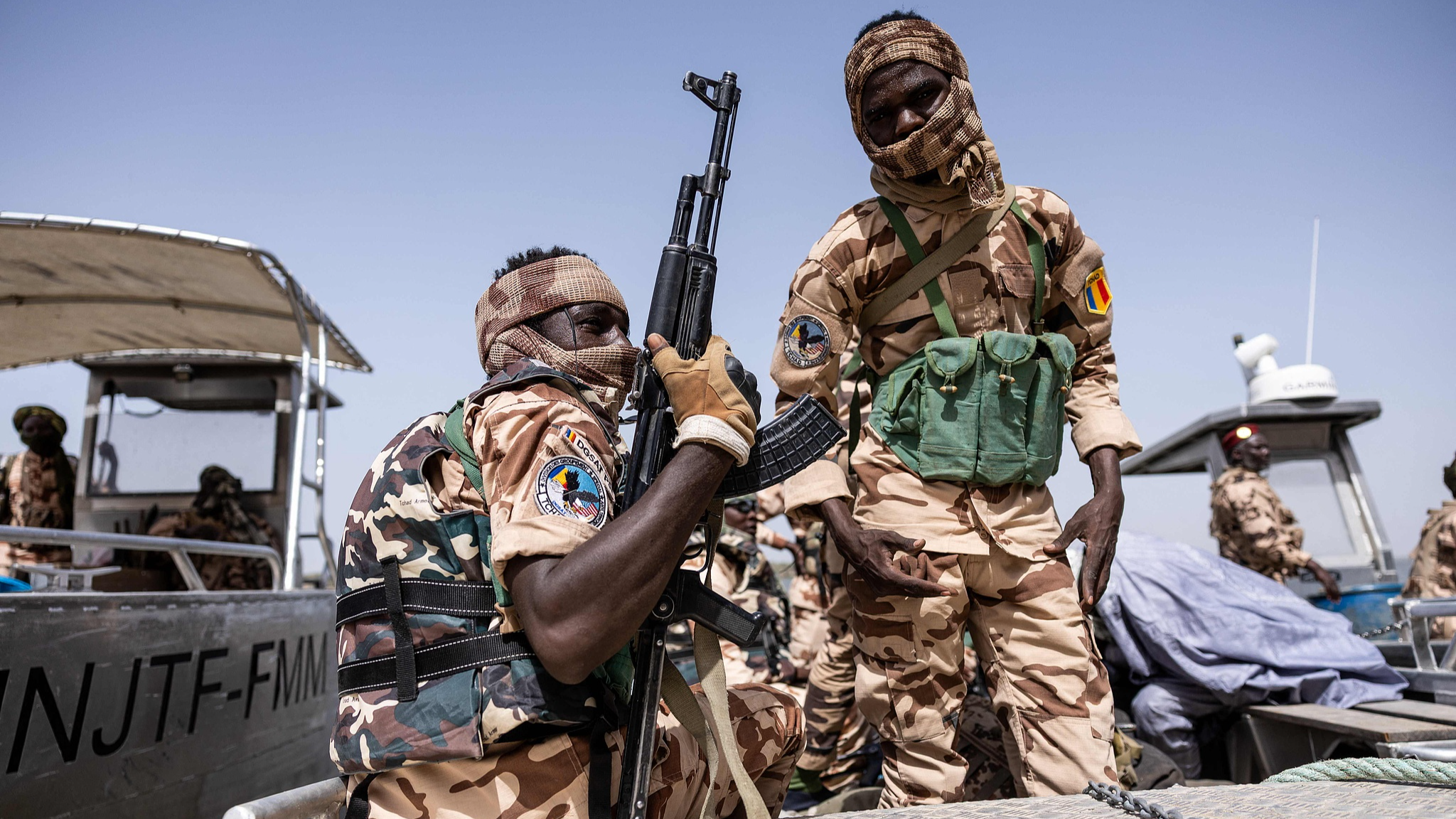 Chadian soldiers board a vessel of a multinational joint task force at a military base in Lake Chad Province, Chad, May 6, 2026. /CFP