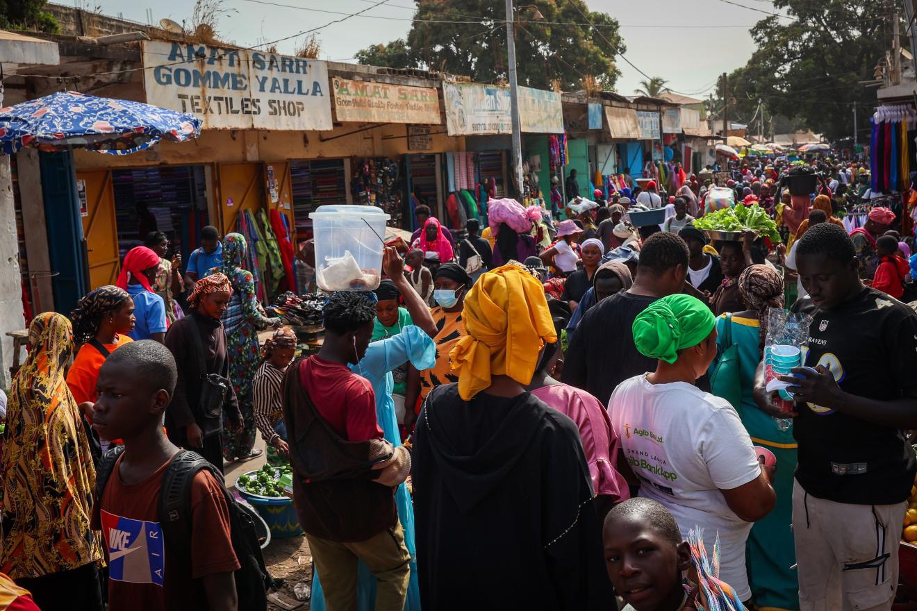 People visit the Serekunda Market during the early hours of the day, which is one of the largest marketplaces in Africa on February 13, 2025 in Serekunda, Gambia. /CFP 
