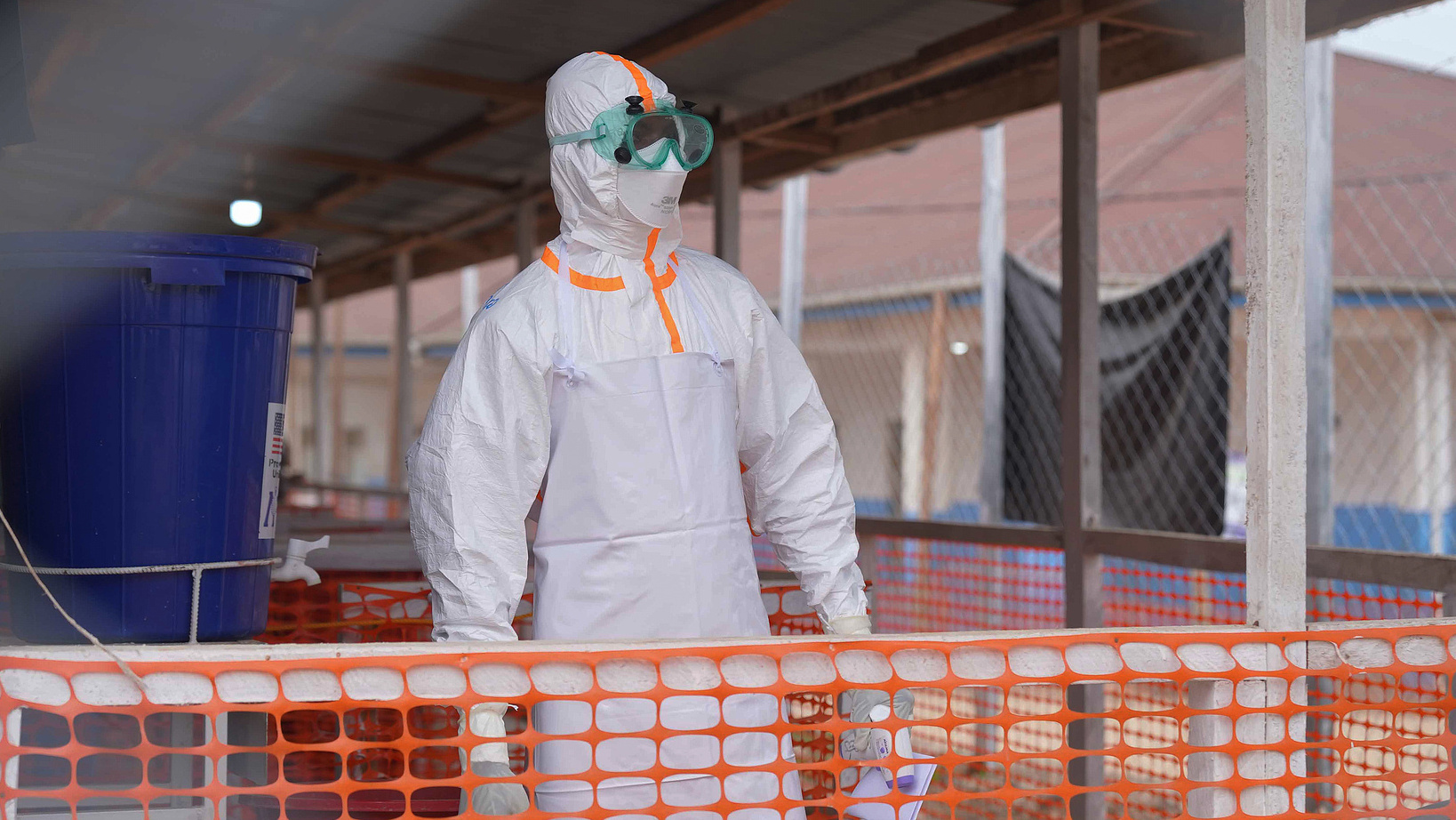 A health worker in protective gear looks on at an Ebola treatment centre in Bunia, Congo, Monday, Aug. 10, 2026. /CFP
