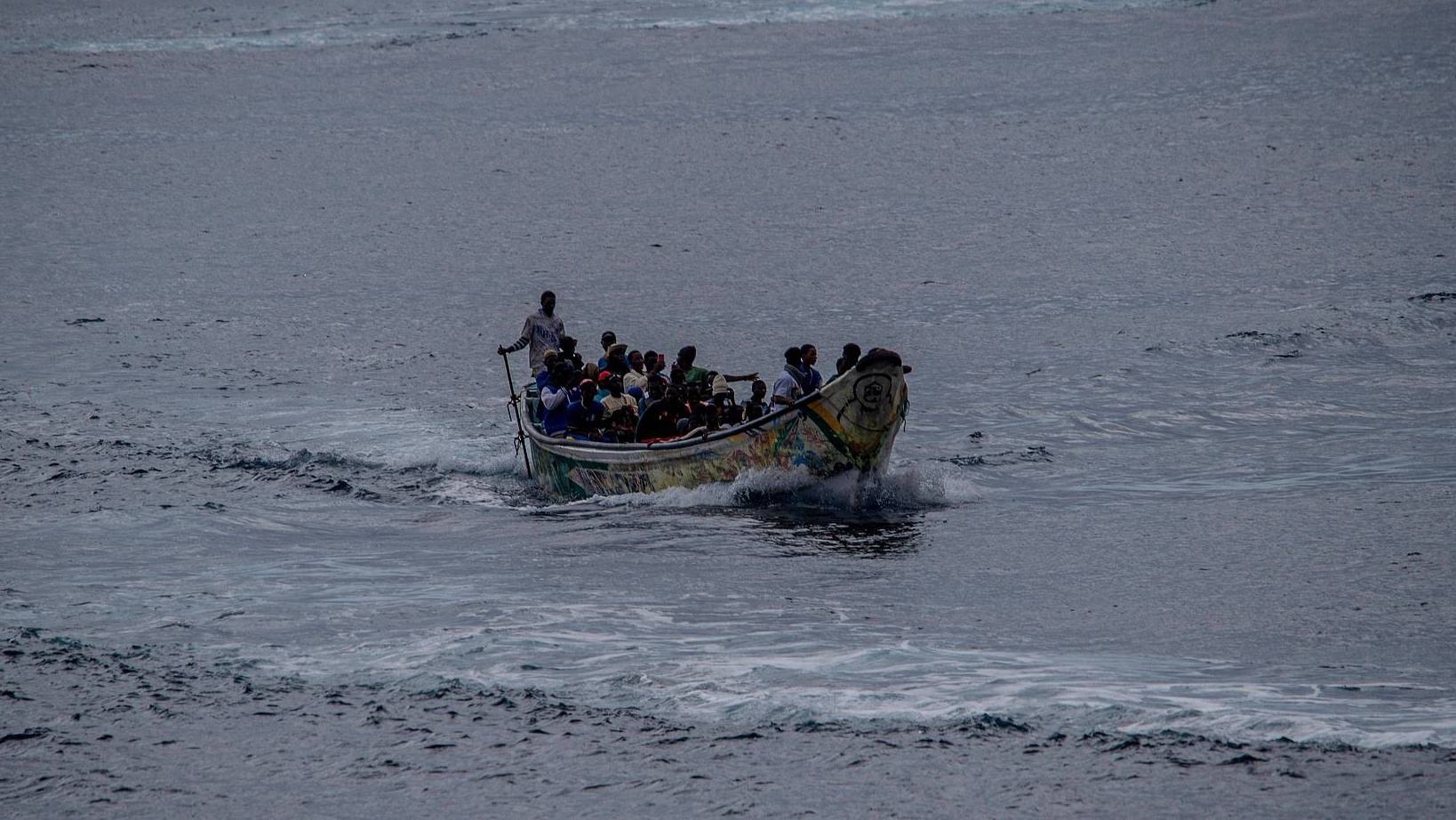 FILE: A wooden migrant boat carrying 65 people arrives at the port of La Restinga on the island of El Hierro, Canary Islands, Spain, October 24, 2025. /CFP