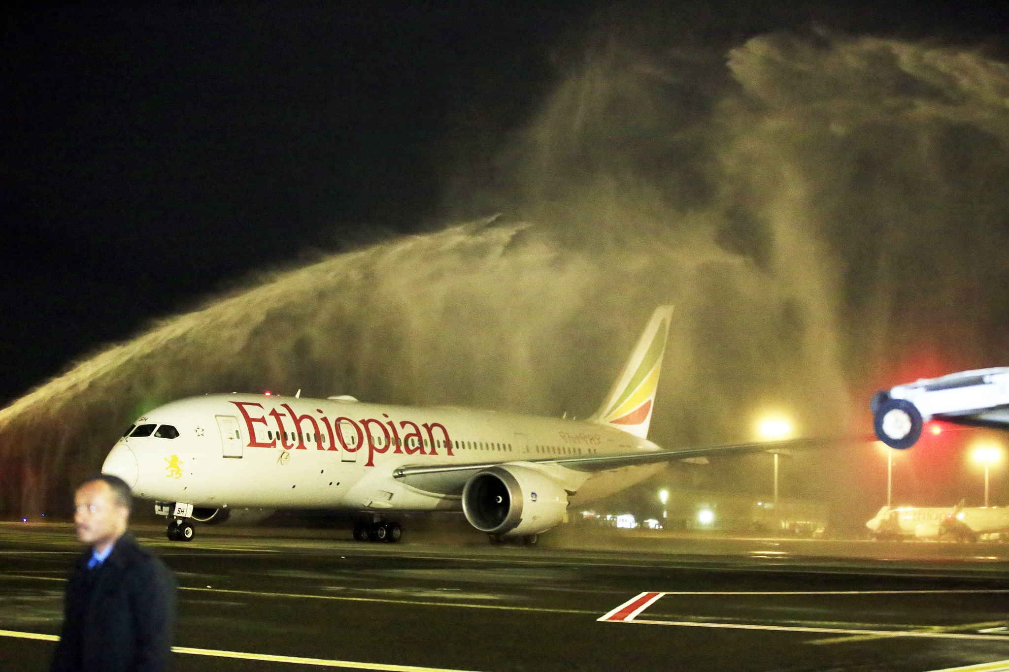 A plane carrying Ethiopian athletes is seen during a welcoming ceremony for athletes returning from the US at Bole Airport in Addis Ababa, Ethiopia, July 27, 2022. /CFP