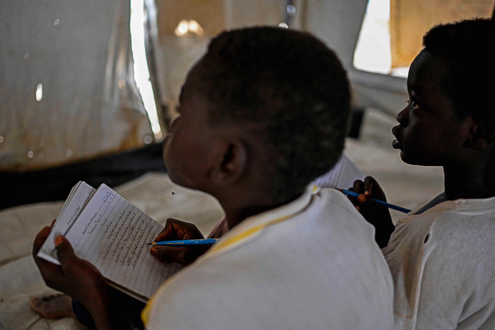 Displaced Sudanese students attend a class at an elementary school run by the Sudanese Coalition for Education in partnership with the United Nations International Children's Emergency Fund (UNICEF), south of Port Sudan, April 26, 2026. /CFP