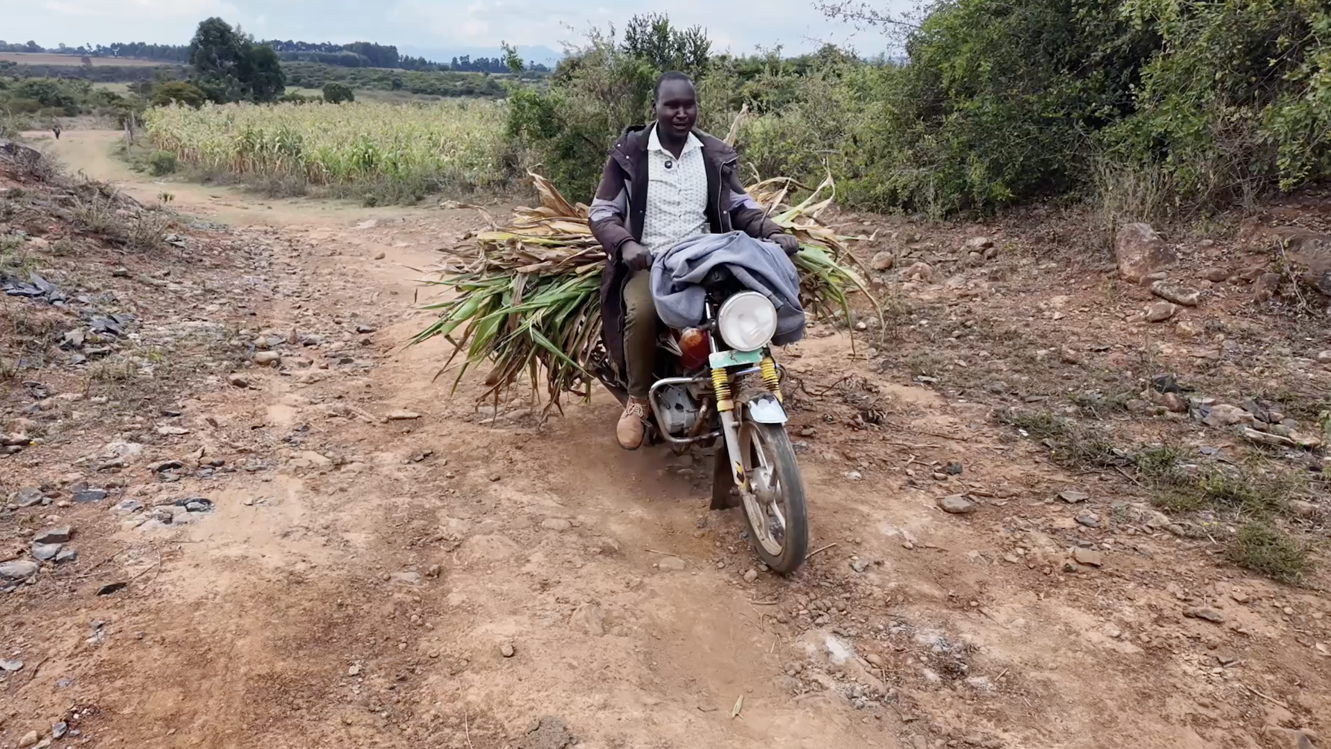Victor Kiprop carries maize stalks on his motorcycle in Moiben, Uasin Gishu, Kenya, August 13, 2026. /CGTN Africa