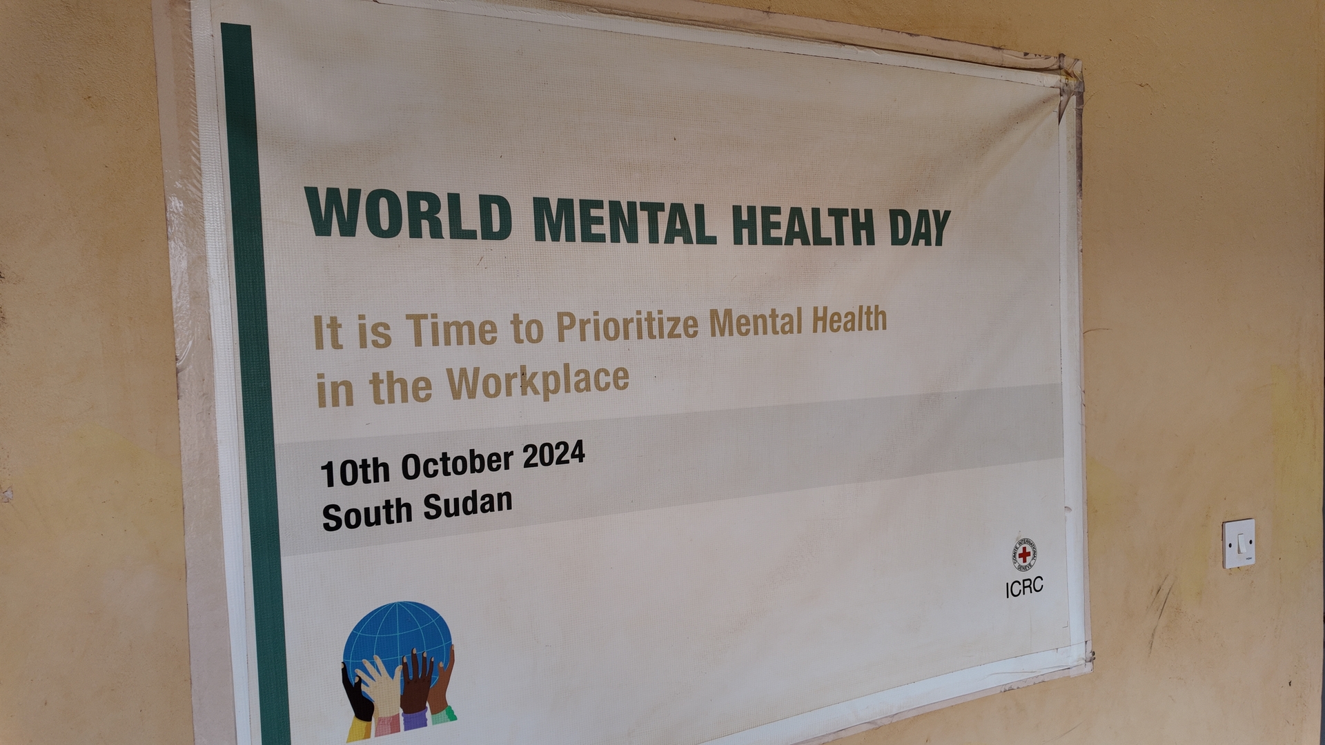 A poster on a wall at the Wau Teaching Hospital in Wau, South Sudan, for the 2024 World Mental Health Day with the theme, 