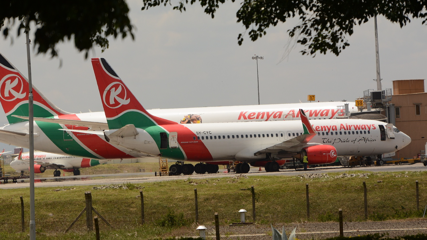 FILE: Kenya Airways planes parked at the Jomo Kenyatta International Airport in Nairobi, Kenya, March 25, 2020. /CFP