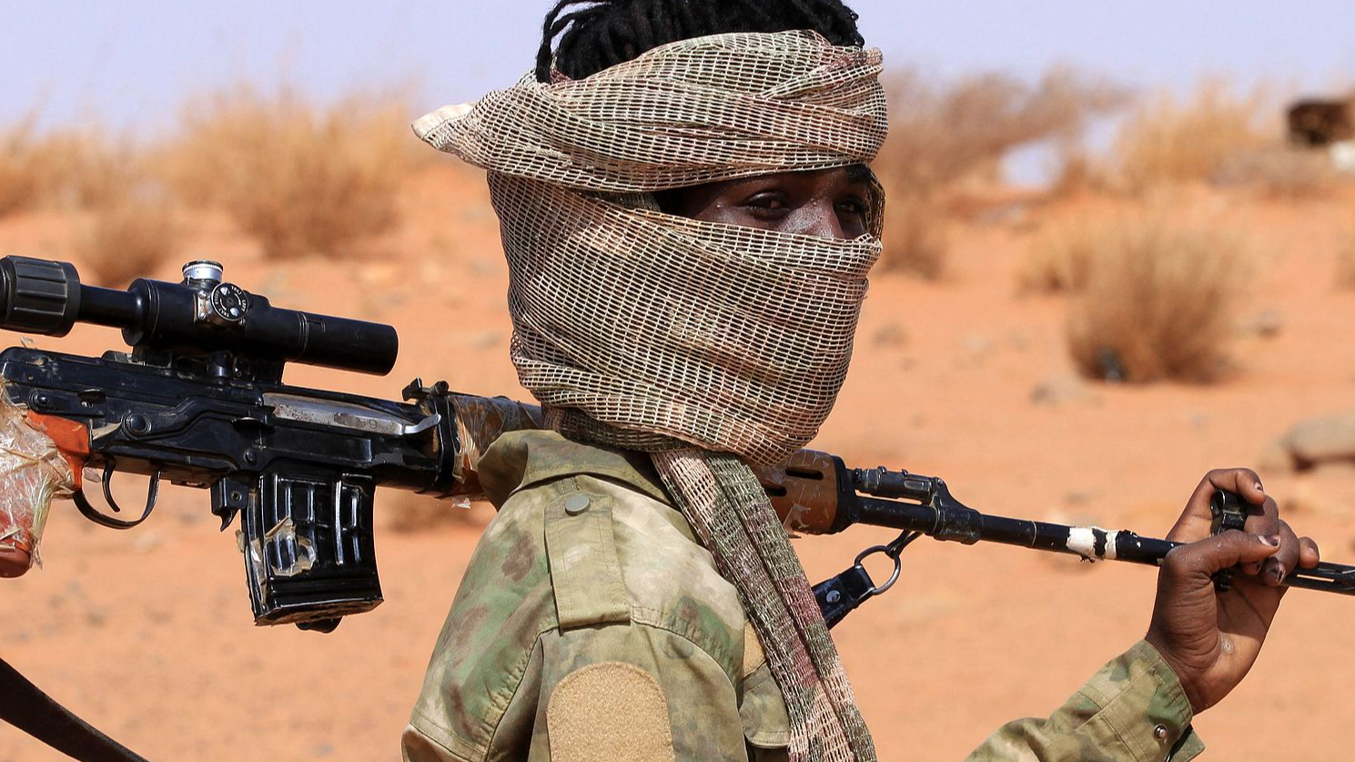 An armed defector from the Rapid Support Force, a paramilitary group, arrived in western Omdurman, Sudan, believed to be preparing to surrender to the Sudanese military, August 19, 2026. /CFP