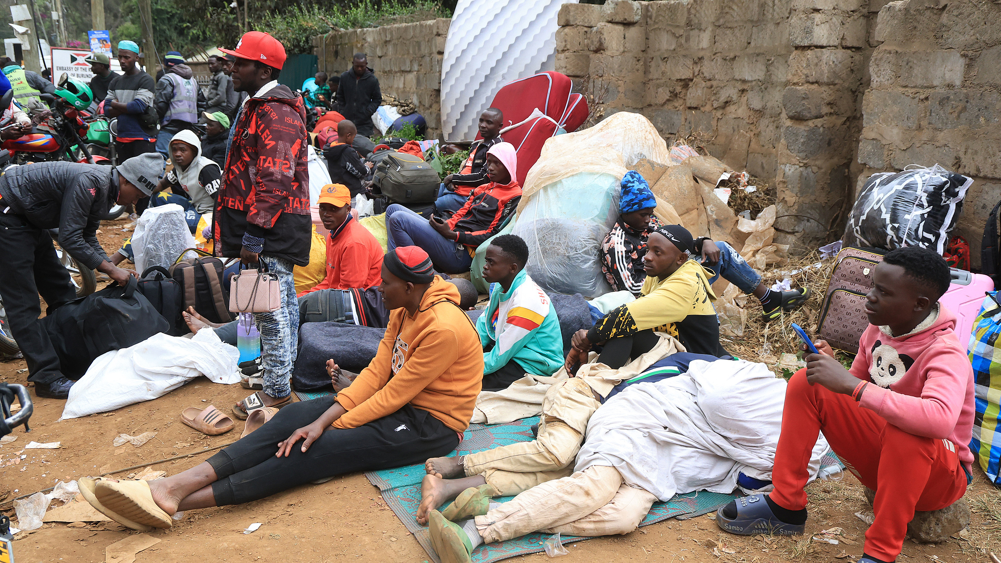 Burundian citizens queue outside the Burundian Embassy to obtain required employment documentation and arrange voluntary repatriation following new government restrictions on foreign-owned small businesses in Nairobi, Kenya on September 10, 2026. /CFP