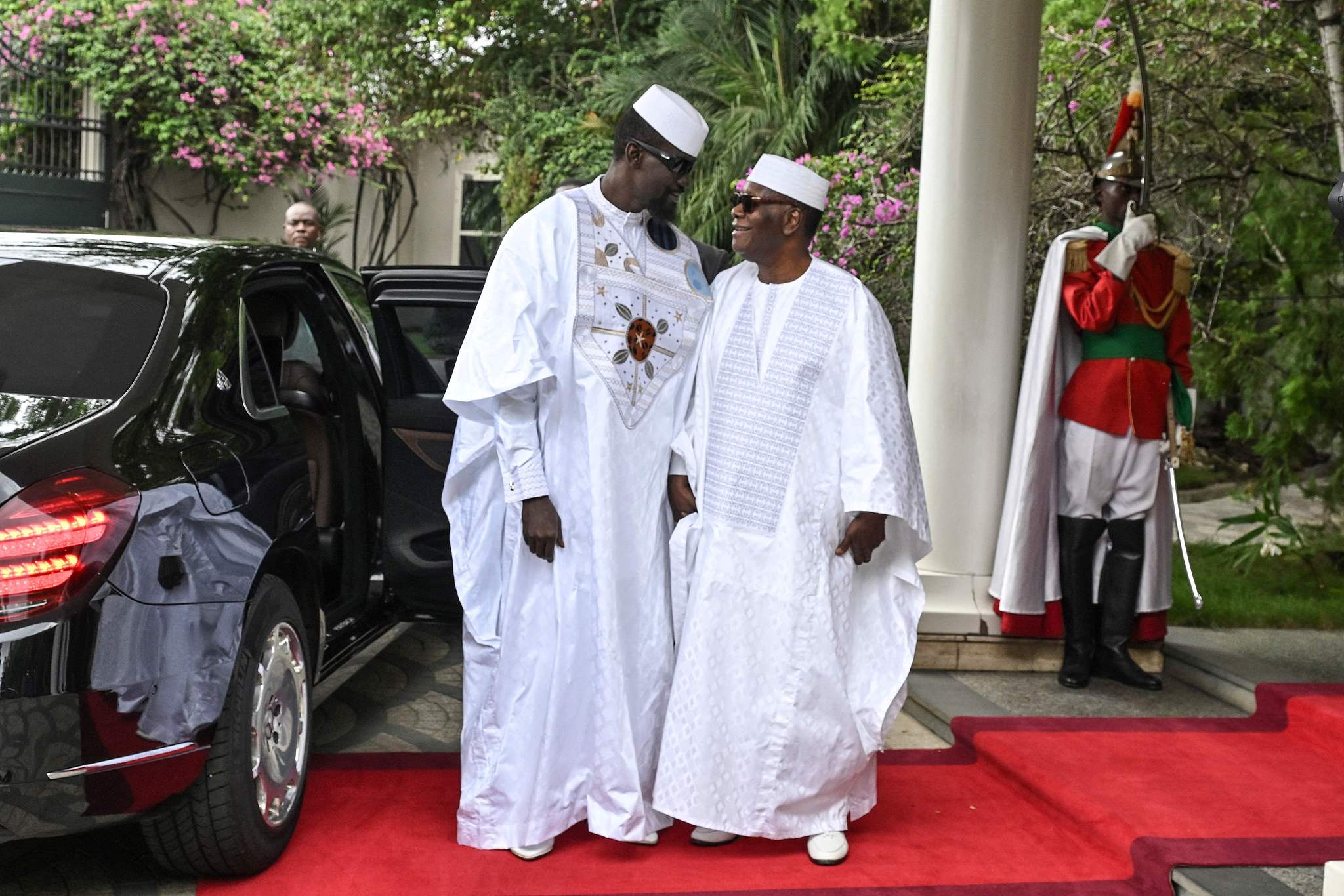 Cote d'Ivoire President Alassane Ouattara (right) welcomes Guinean President Mamady Doumbouya (left) to the presidential residence ahead of their meeting in Abidjan, Cote d'Ivoire, September 13, 2026. /CFP