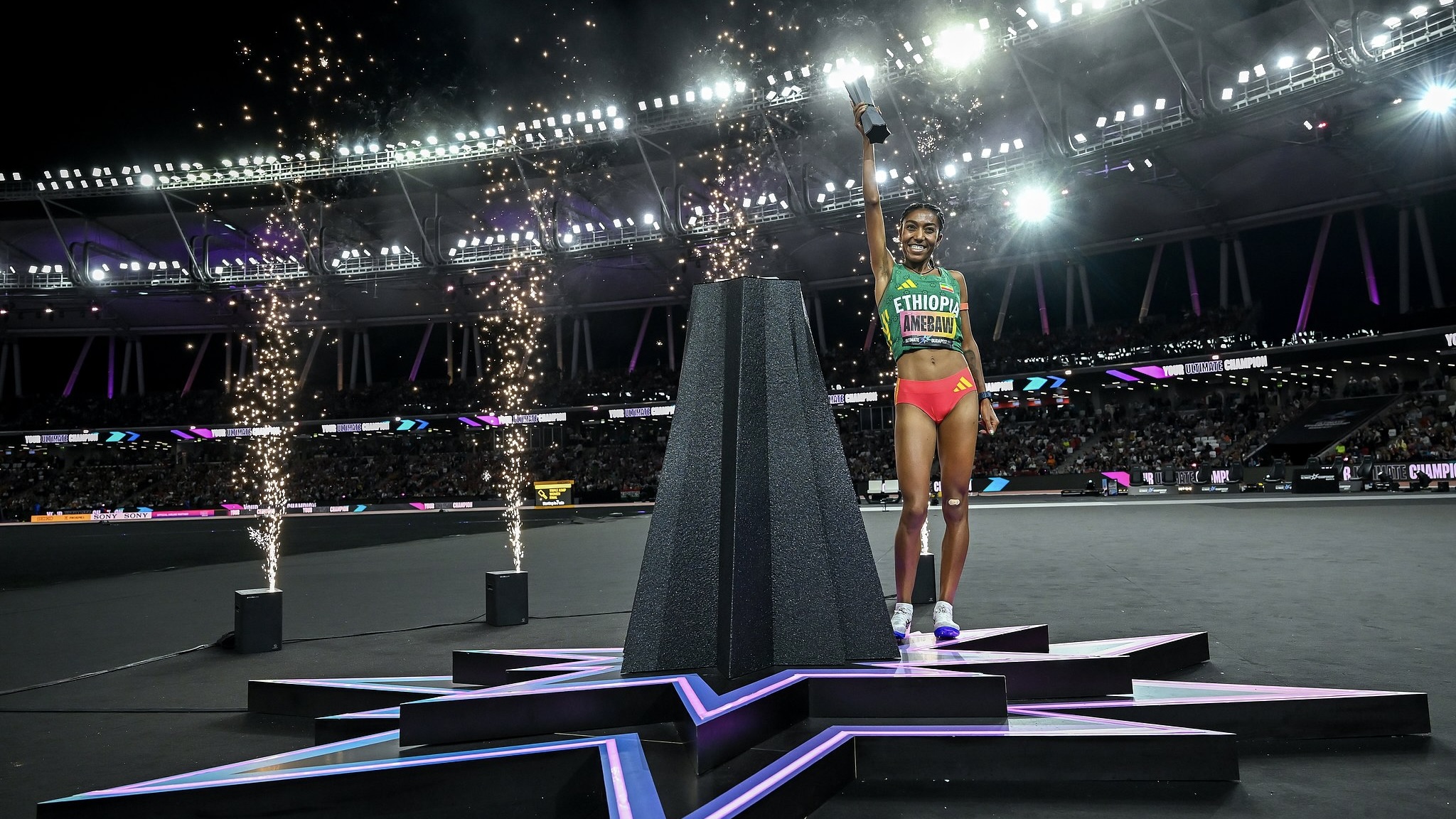 Ethiopian athlete Likina Amebaw celebrates with her trophy during the medal ceremony of the women's 5000-meter final at the World Athletics Ultimate Championships at the National Athletics Centre in Budapest, Hungary on September 13, 2026. /CFP
