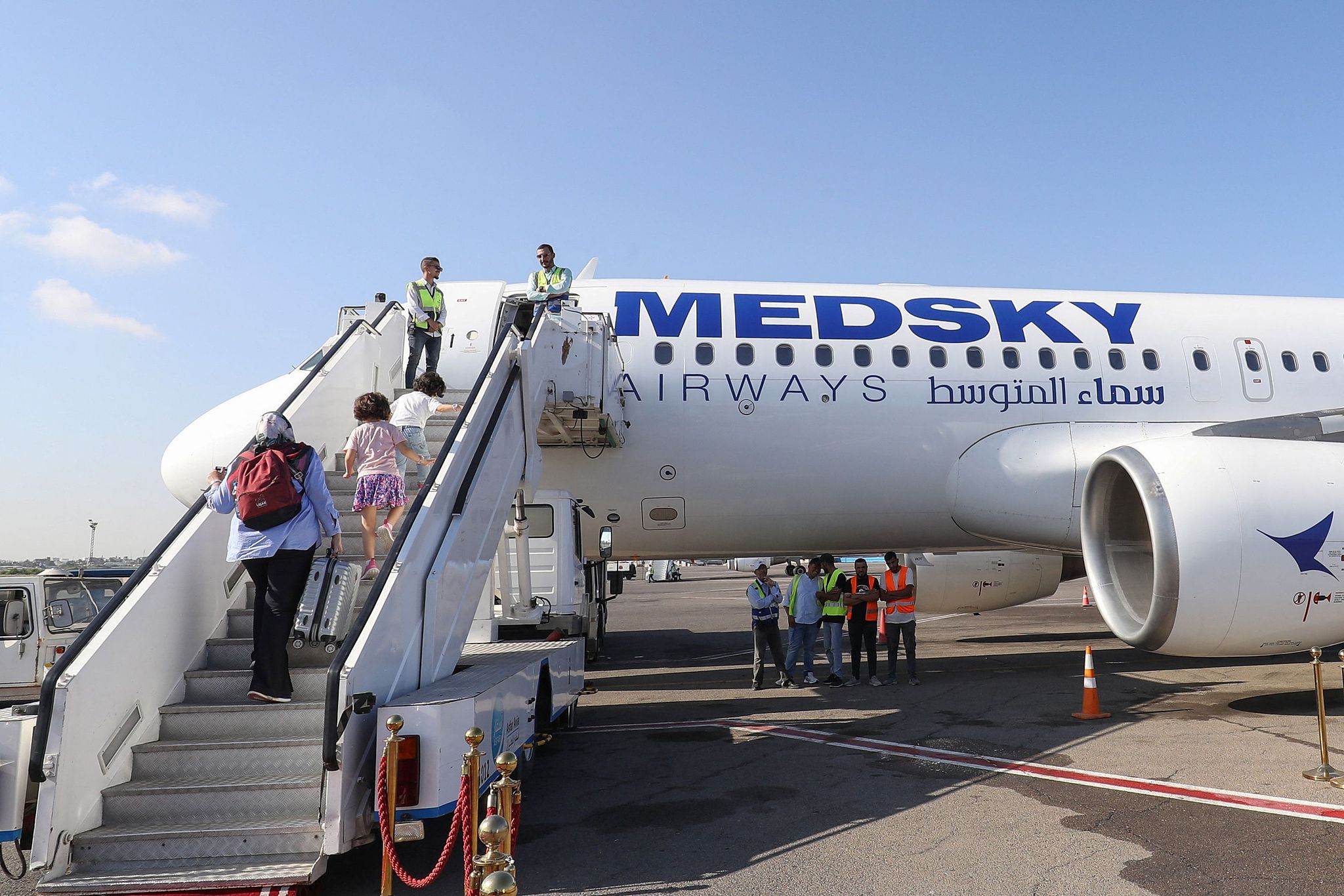 FILE: Passengers board the first flight from Tripoli to Rome on September 30, 2023, after the Italian government lifted its 10-year-old ban on Libyan civil aviation. /CFP