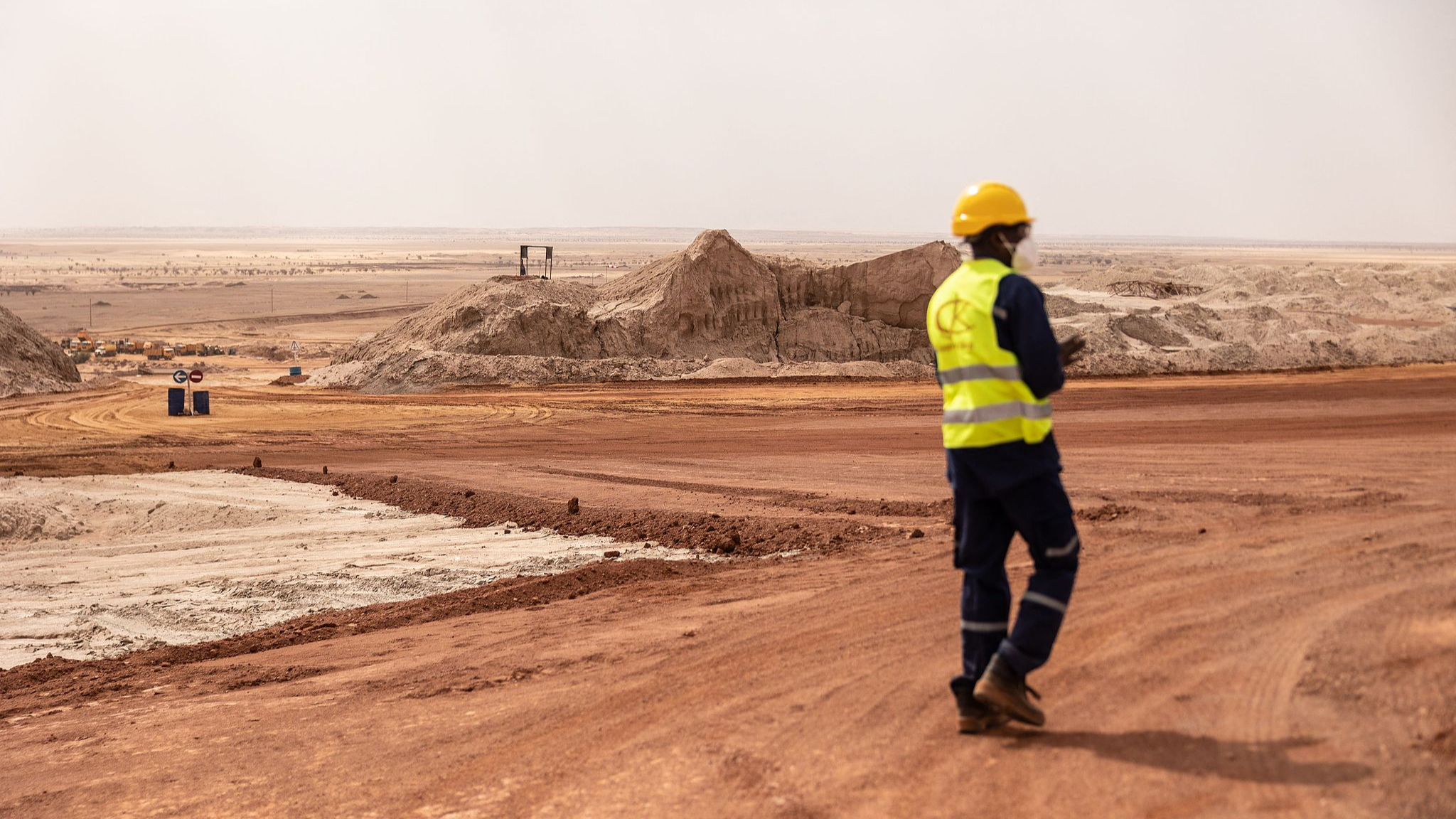 A man walks on the waste disposal site of a uranium mine in Arlit, Niger, March 8, 2023. /CFP 