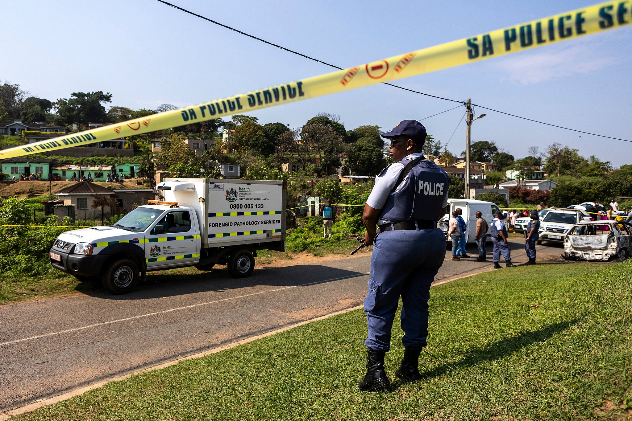 A police officer is seen at a scene of a mass shooting at a house party in KwaMakhutha township south of the city Durban, South Africa, September 23, 2026. /VCG