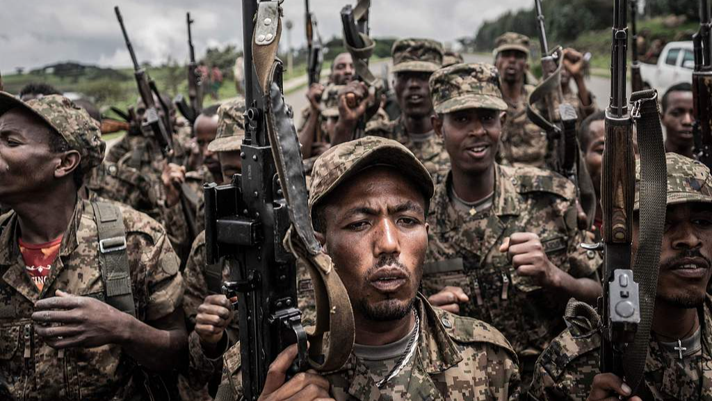 Ethiopian National Defence Forces shout slogans after completing training at the Dabat battlefield in Gondar, Ethiopia, September 14, 2021. /CFP