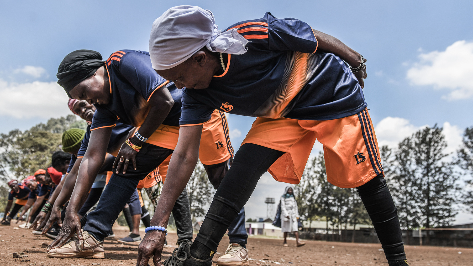 Women take part in a football training session with the Mugumoini team in Kibera, Nairobi, Kenya, September 25, 2026. /VCG