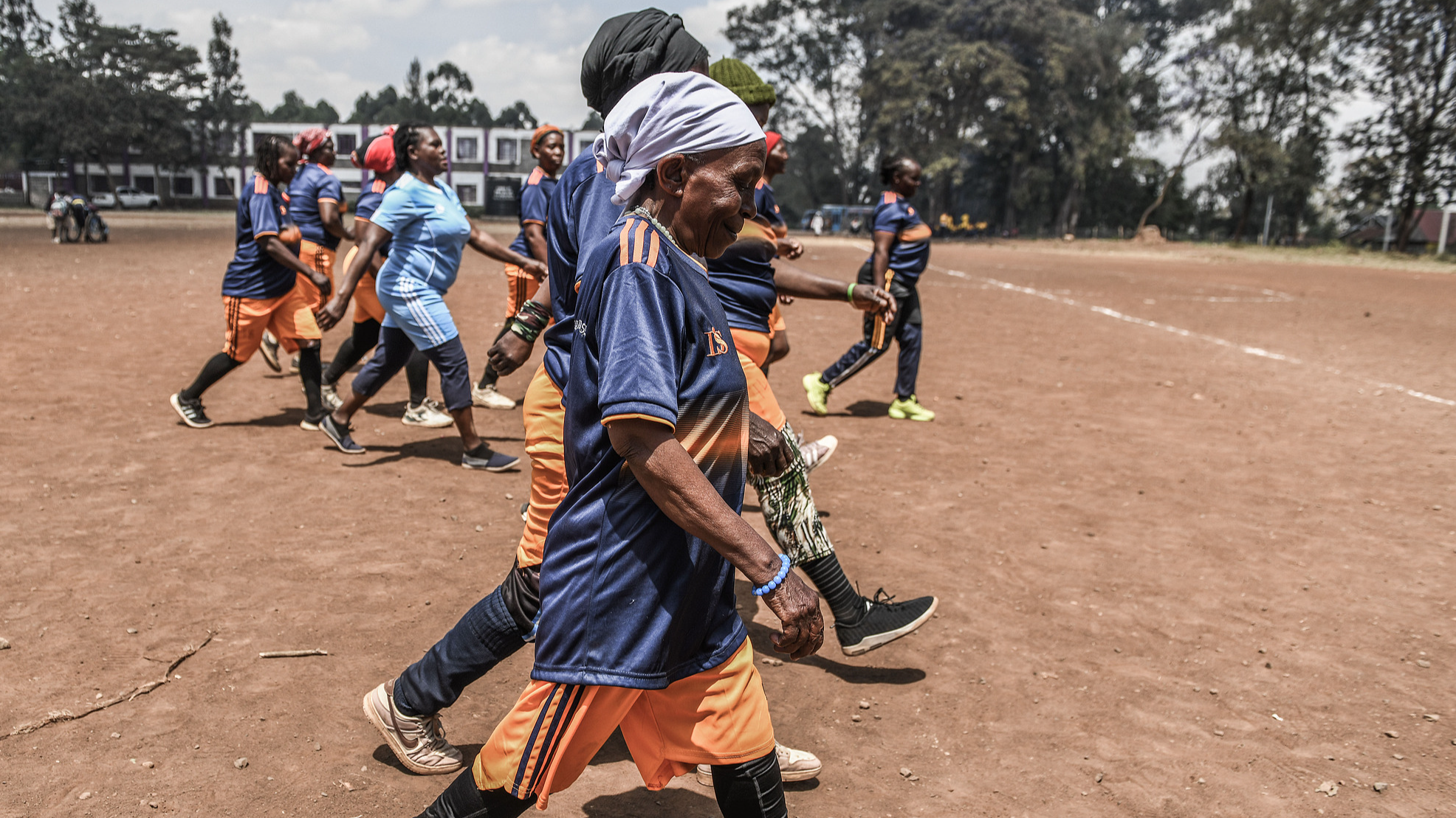 Women take part in a football training session with the Mugumoini team in Kibera, Nairobi, Kenya, September 25, 2026. /VCG