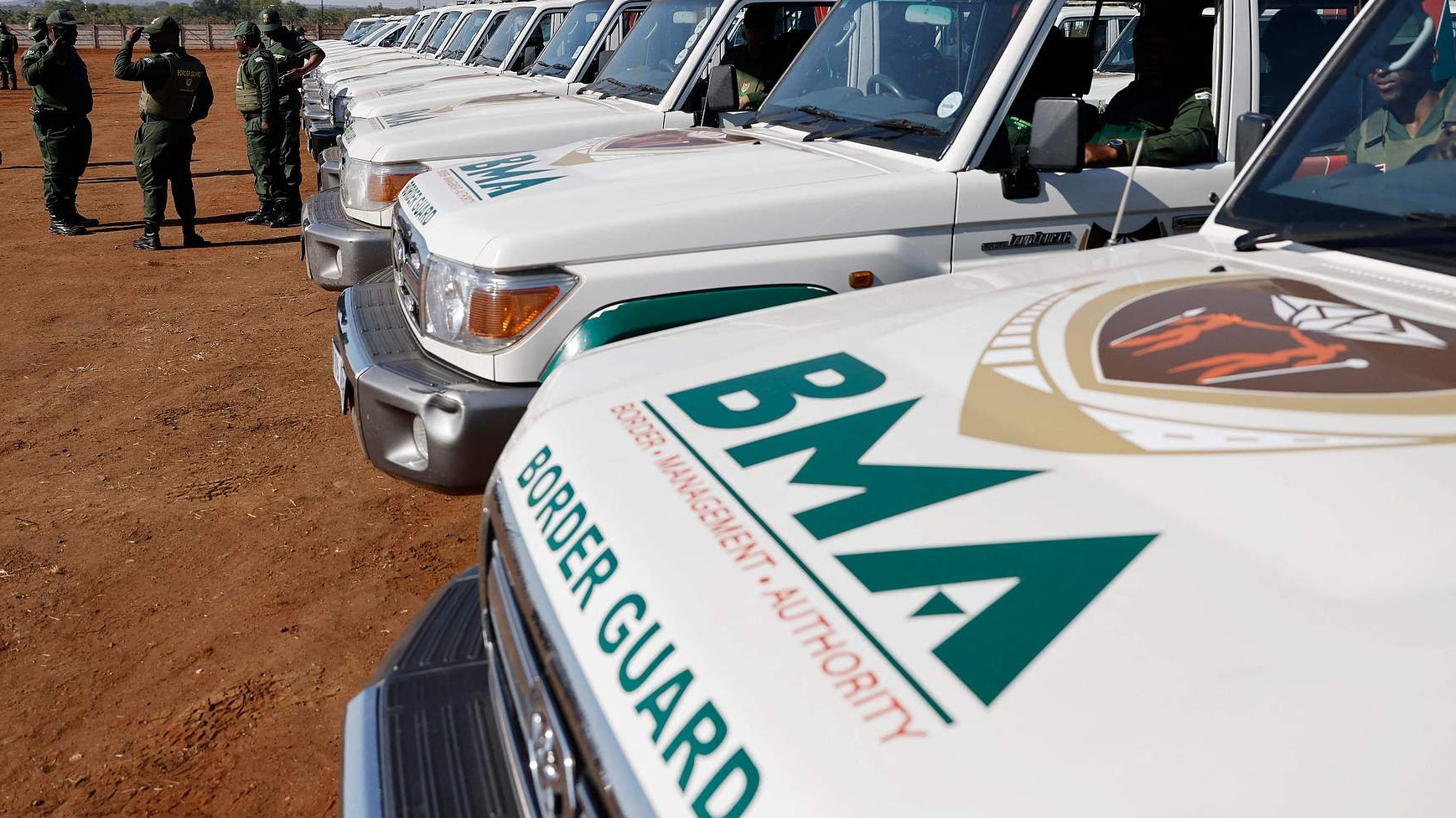 South African Border Management Authority (BMA) officers are seen with their vehicles ahead of the launch of their force at the Musina Show Grounds in Musina on October 5, 2023. /VCG
