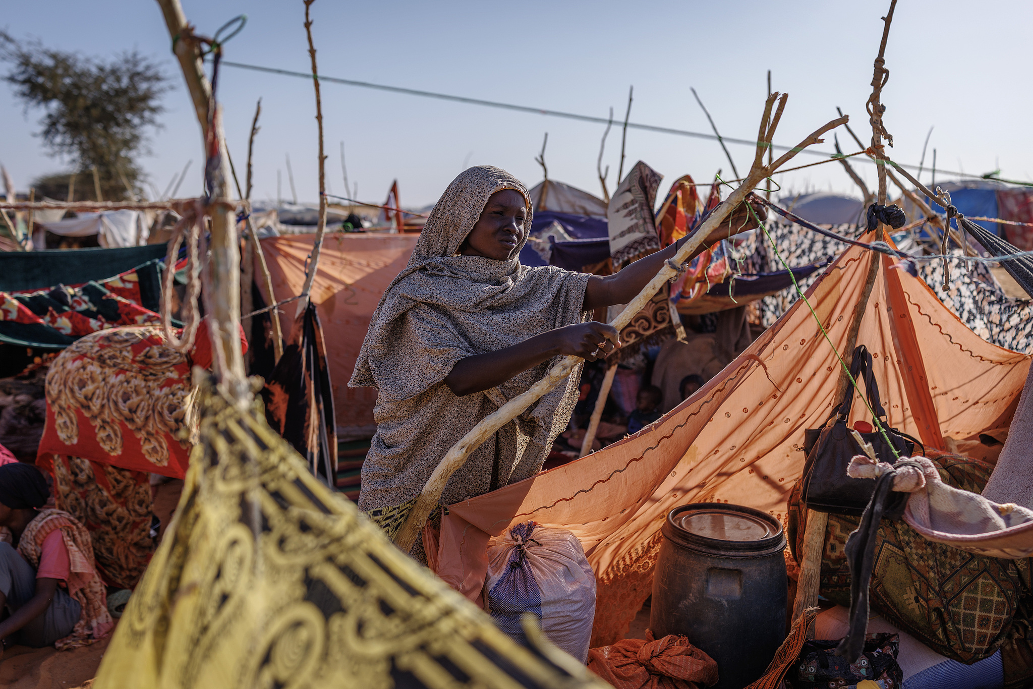 A woman is pictured in her temporary shelter in a refugee camp near Iriba, Chad, on February 22, 2026. /VCG