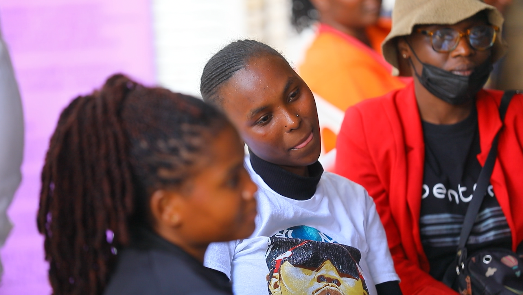 Teresia Nyambura,(in white) listening through the pyschodrama session in Mathare, Nairobi, Kenya, on October 7, 2026. /CGTN