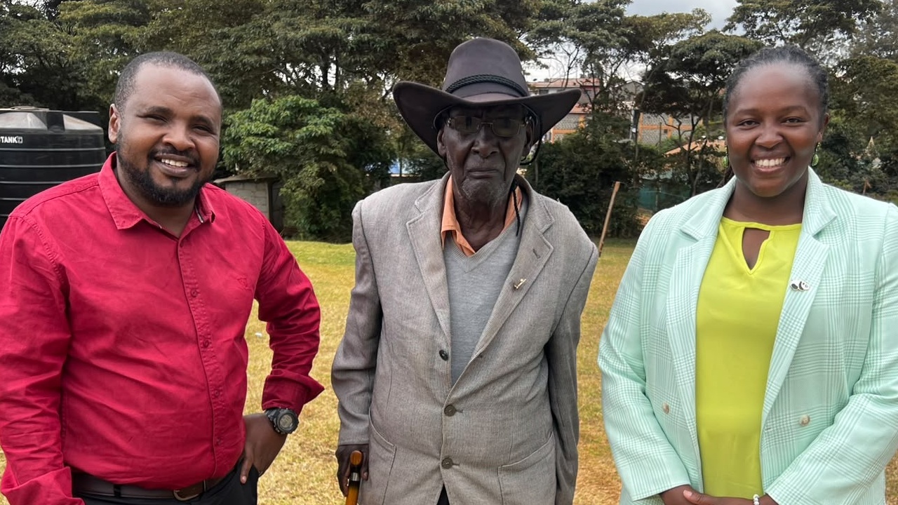 CGTN reporter Enoch Sikolia (left) stands with Ephraim Matindi Hinga (center) and CGTN field producer Eunice Gatonye (right) in Kiambu County, Kenya, on October 9, 2026. /CGTN