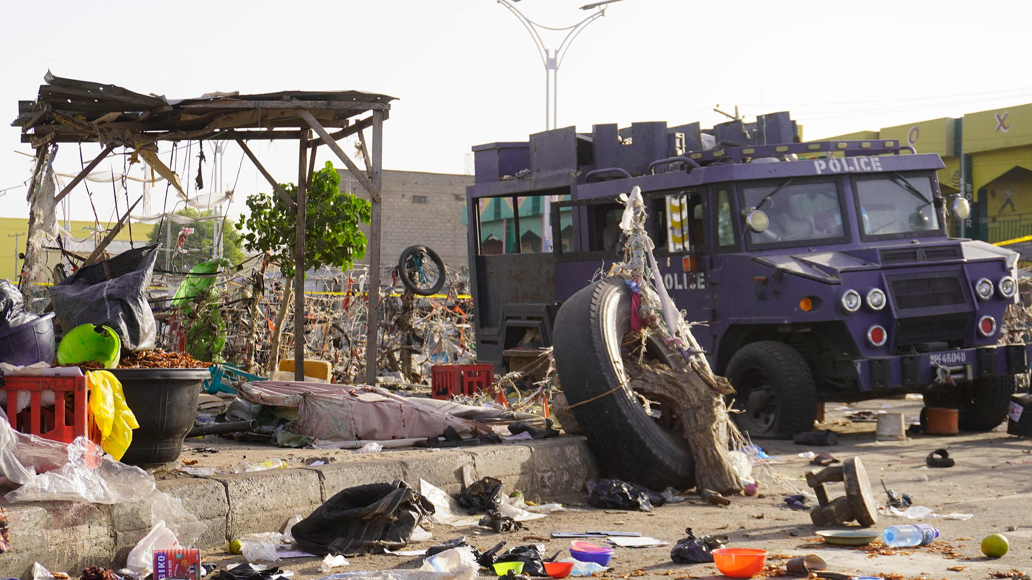 A general view of an armored police vehicle at a market in Maiduguri, Nigeria, a day after blasts in the city, March 17, 2026. /VCG